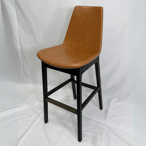 Tan leather Eiffel HB counter stool with black wooden legs and brass footrest.