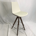 Eiffel Cream swivel bar stool with 360° rotation, cream upholstery, wooden legs, chrome footring.
