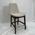 Eiffel HB Beige Boucle Bar Stool with dark wood legs and chrome footrest.