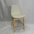 Eiffel HB Cream Leather Counter Stool with back support, natural wood legs, and chrome footrest.